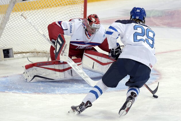 Finland's Patrik Laine tries to score against goalie Vitek Vanecek of the Czech Republic during the 2016 IIHF World Junior U20 Ice Hockey Championships tournament match between Finland and Czech Republic in Helsinki, Finland, Thursday, Dec. 31, 2015. (Markku Ulander/Lehtikuva via AP)      FINLAND OUT