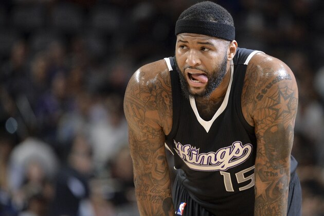 Sacramento Kings center DeMarcus Cousins pauses on the court during the first half of an NBA basketball game against the San Antonio Spurs, Saturday, March 5, 2016, in San Antonio. San Antonio won 104-94. (AP Photo/Darren Abate)