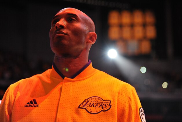 LOS ANGELES, CA - APRIL 6:  Kobe Bryant #24 of the Los Angeles Lakers stands for the national anthem before the game against the Los Angeles Clippers on April 6, 2016 at STAPLES Center in Los Angeles, California. NOTE TO USER: User expressly acknowledges and agrees that, by downloading and/or using this Photograph, user is consenting to the terms and conditions of the Getty Images License Agreement. Mandatory Copyright Notice: Copyright 2016 NBAE (Photo by Andrew D. Bernstein/NBAE via Getty Images)