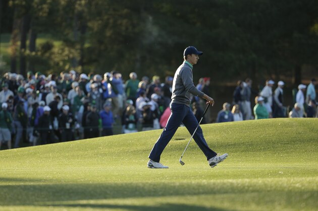 Jordan Spieth walks along the 18th fairway during the third round of the Masters golf tournament Saturday, April 9, 2016, in Augusta, Ga. (AP Photo/Charlie Riedel)