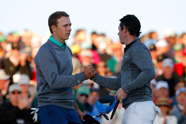 AUGUSTA, GEORGIA - APRIL 09:  Jordan Spieth (L) of the United States shakes hands with Rory McIlroy of Northern Ireland on the 18th green during the third round of the 2016 Masters Tournament at Augusta National Golf Club on April 9, 2016 in Augusta, Georgia.  (Photo by Kevin C. Cox/Getty Images)