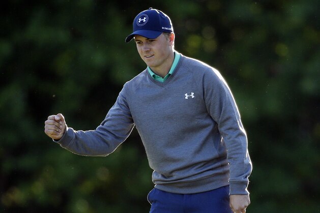 Jordan Spieth punches the air after a birdie on the 15th hole during the third round of the Masters golf tournament Saturday, April 9, 2016, in Augusta, Ga. (AP Photo/Charlie Riedel)