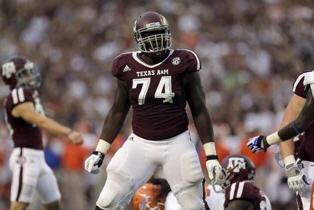 Texas A&M offensive linesman Germain Ifedi reacts after a play against Sam Houston State during the first quarter of an NCAA college football game Saturday, Sept. 7, 2013, in College Station, Texas. (AP Photo/David J. Phillip)