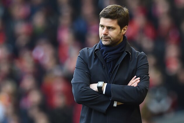 Tottenham Hotspur's Argentinian head coach Mauricio Pochettino watches from the touchline during the English Premier League football match between Liverpool and Tottenham Hotspur at Anfield in Liverpool, north west England on April 2, 2016. / AFP / Paul ELLIS / RESTRICTED TO EDITORIAL USE. No use with unauthorized audio, video, data, fixture lists, club/league logos or 'live' services. Online in-match use limited to 75 images, no video emulation. No use in betting, games or single club/league/player publications.  /         (Photo credit should read PAUL ELLIS/AFP/Getty Images)