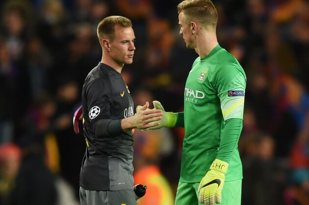 BARCELONA, SPAIN - MARCH 18: Marc-Andre ter Stegen of Barcelona shakes hands with Joe Hart of Manchester City after the UEFA Champions League Round of 16 second leg match between Barcelona and Manchester City at Camp Nou on March 18, 2015 in Barcelona, Spain.  (Photo by Michael Regan/Getty Images)