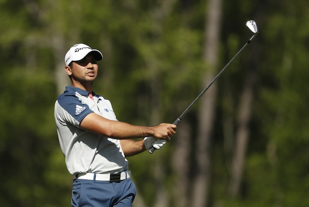 Apr 7, 2016; Augusta, GA, USA; Jason Day hits his tee shot on the 12th hole during the first round of the 2016 The Masters golf tournament at Augusta National Golf Club. Mandatory Credit: Rob Schumacher-USA TODAY Sports
