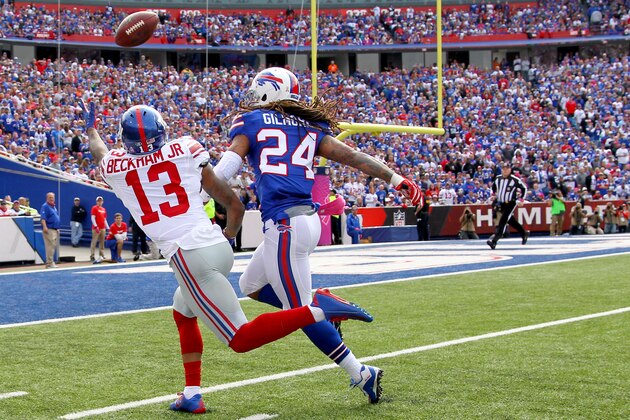 New York Giants wide receiver Odell Beckham (13) is unable to pull in a pass from quarterback Eli Manning, not pictured, as Buffalo Bills cornerback Stephon Gilmore (24) defends during the first half of an NFL football game, Sunday, Oct. 4, 2015, in Orchard Park, N.Y. (AP Photo/Bill Wippert)