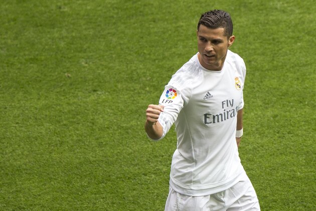 MADRID, SPAIN - APRIL 09:  Cristiano Ronaldo (R) of Real Madrid CF celebrates scoring their third goal during the La Liga match between Real Madrid CF and SD Eibar at Estadio Santiago Bernabeu on April 9, 2016 in Madrid, Spain.  (Photo by Gonzalo Arroyo Moreno/Getty Images)
