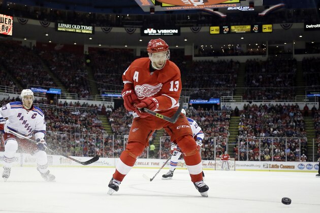Detroit Red Wings center Pavel Datsyuk chases the puck during the third period of an NHL hockey game against the New York Rangers, Saturday, March 12, 2016, in Detroit. (AP Photo/Carlos Osorio)