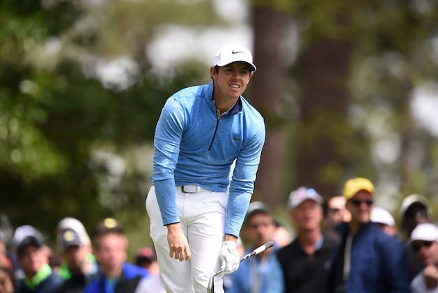 Northern Ireland's Rory McIlroy reacts after teeing off on the 4th hole during Round 4 of the 80th Masters Golf Tournament at the Augusta National Golf Club on April 10, 2016, in Augusta, Georgia. / AFP / Jim Watson        (Photo credit should read JIM WATSON/AFP/Getty Images)