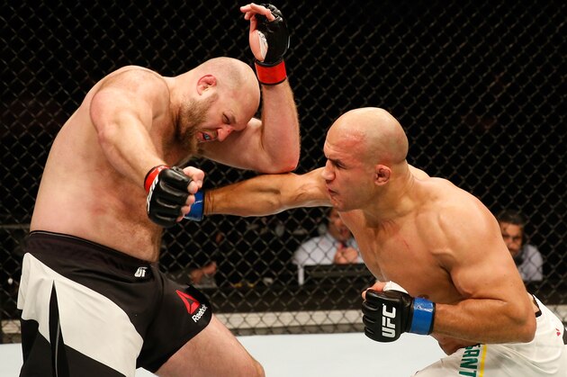ZAGREB, CROATIA - APRIL 10:   (R-L) Junior Dos Santos punches Ben Rothwell in their heavyweight bout during the UFC Fight Night event at the Arena Zagreb on April 10, 2016 in Zagreb, Croatia. (Photo by Srdjan Stevanovic/Zuffa LLC/Zuffa LLC via Getty Images)