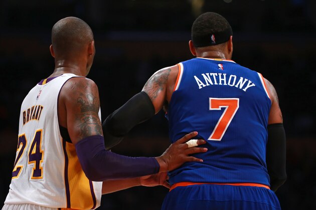 LOS ANGELES, CA - MARCH 13:  Kobe Bryant #24 of the Los Angeles Lakers guards Carmelo Anthony #7 of the New York Knicks during their NBA game at Staples Center on March 13, 2016 in Los Angeles, California. The Knicks defeated the Lakers 90-87. NOTE TO USER: User expressly acknowledges and agrees that, by downloading and or using this photograph, User is consenting to the terms and conditions of the Getty Images License Agreement.  (Photo by Victor Decolongon/Getty Images)