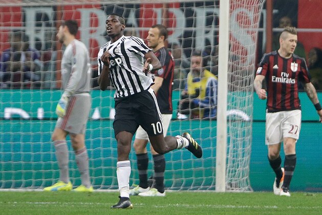 Juventus' Paul Pogba celebrates after scoring during a Serie A soccer match between AC Milan and Juventus, at the San Siro stadium in Milan, Italy, Saturday, April 9, 2016. (AP Photo/Luca Bruno)