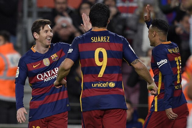 Barcelona's Uruguayan forward Luis Suarez (C) runs to celebrate a goal with Barcelona's Brazilian forward Neymar (R) and Barcelona's Argentinian forward Lionel Messi during the Spanish league football match FC Barcelona vs RC Celta de Vigo at the Camp Nou stadium in Barcelona on February 14, 2016.
/ AFP / LLUIS GENE (Photo credit should read LLUIS GENE/AFP/Getty Images) Barcelona's Uruguayan forward Luis Suarez (C) runs to celebrate a goal with Barcelona's Brazilian forward Neymar (R) and Barcelona's Argentinian forward Lionel Messi during the Spanish league football match FC Barcelona vs RC Celta de Vigo at the Camp Nou stadium in Barcelona on February 14, 2016.
/ AFP / LLUIS GENE (Photo credit should read LLUIS GENE/AFP/Getty Images)