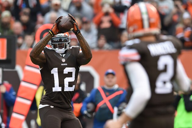 CLEVELAND, OH - DECEMBER 14:  Josh Gordon #12 makes a catch on a ball thrown by Johnny Manziel #2 of the Cleveland Browns during the second quarter against the Cincinnati Bengals at FirstEnergy Stadium on December 14, 2014 in Cleveland, Ohio.  (Photo by Jason Miller/Getty Images)