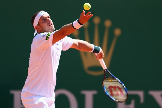 MONTE-CARLO, MONACO - APRIL 11:  Gilles Muller of Luxemburg in action during his defeat to Gael Monfils of France during day two of the Monte Carlo Rolex Masters at Monte-Carlo Sporting Club on April 11, 2016 in Monte-Carlo, Monaco.  (Photo by Michael Steele/Getty Images)