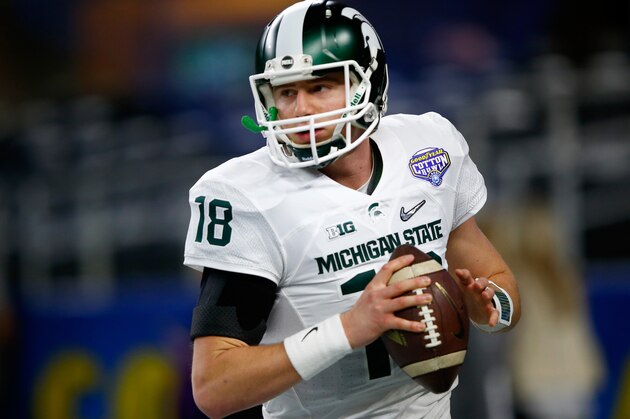ARLINGTON, TX - DECEMBER 31:  Connor Cook #18 of the Michigan State Spartans warms up prior to the Goodyear Cotton Bowl against the Alabama Crimson Tide at AT&T Stadium on December 31, 2015 in Arlington, Texas.  (Photo by Jamie Squire/Getty Images)