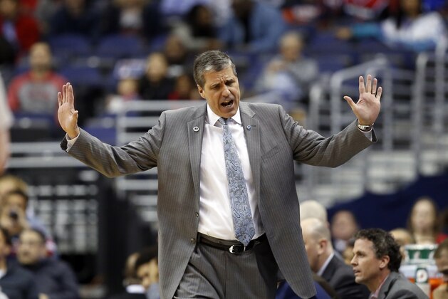 Washington Wizards head coach Randy Wittman reacts during the first half of an NBA basketball game against the Charlotte Hornets, Sunday, April 10, 2016, in Washington. (AP Photo/Alex Brandon)