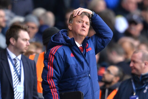 Manchester United's Dutch manager Louis van Gaal leaves the pitch after losing the English Premier League football match between Tottenham Hotspur and Manchester United at White Hart Lane in London, on April 10, 2016. 
Tottenham won 3-0. / AFP / GLYN KIRK / RESTRICTED TO EDITORIAL USE. No use with unauthorized audio, video, data, fixture lists, club/league logos or 'live' services. Online in-match use limited to 75 images, no video emulation. No use in betting, games or single club/league/player publications.  /         (Photo credit should read GLYN KIRK/AFP/Getty Images)