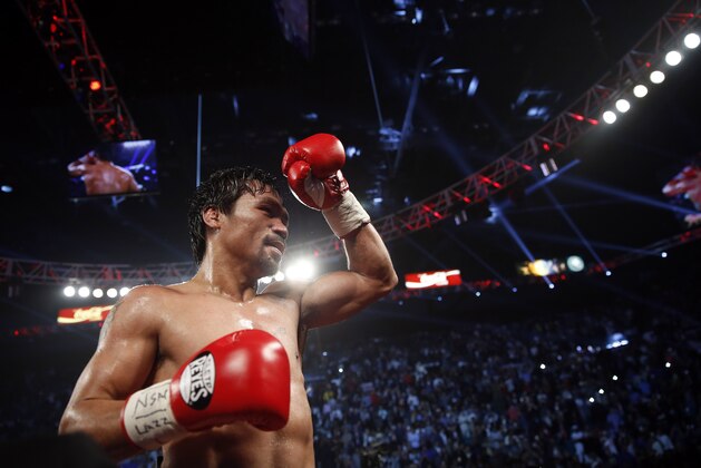 Manny Pacquiao, of the Philippines, speaks during a news conference following his welterweight title boxing match against Timothy Bradley Saturday April 9, 2016, in Las Vegas. (AP Photo/Isaac Brekken)