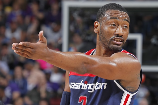 SACRAMENTO, CA - MARCH 30: John Wall #2 of the Washington Wizards looks on during the game against the Sacramento Kings on March 30, 2016 at Sleep Train Arena in Sacramento, California. NOTE TO USER: User expressly acknowledges and agrees that, by downloading and or using this photograph, User is consenting to the terms and conditions of the Getty Images Agreement. Mandatory Copyright Notice: Copyright 2016 NBAE (Photo by Rocky Widner/NBAE via Getty Images)