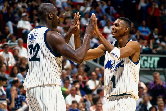 ORLANDO, FL - JANUARY 6: Shaquille O'Neal #32 and Anfernee Hardaway #1 of the Orlando Magic celebrate during a game against the Minnesota Timberwolves on January 6, 1995 at the Amway Arena in Orlando, Florida. NOTE TO USER: User expressly acknowledges and agrees that, by downloading and or using this photograph, User is consenting to the terms and conditions of the Getty Images License Agreement. Mandatory Copyright Notice: Copyright 1995 NBAE (Photo by Fernando Medina/NBAE via Getty Images)