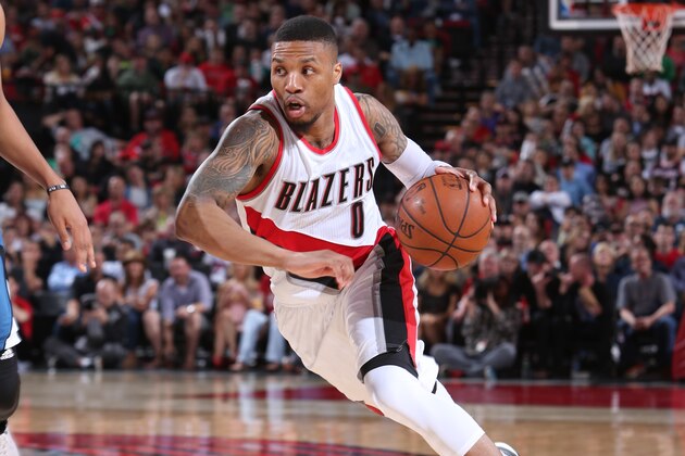 PORTLAND, OR - APRIL 9:  Damian Lillard #0 of the Portland Trail Blazers drives to the basket against the Minnesota Timberwolves on April 9, 2016 at the Moda Center in Portland, Oregon. NOTE TO USER: User expressly acknowledges and agrees that, by downloading and or using this Photograph, user is consenting to the terms and conditions of the Getty Images License Agreement. Mandatory Copyright Notice: Copyright 2016 NBAE (Photo by Sam Forencich/NBAE via Getty Images)
