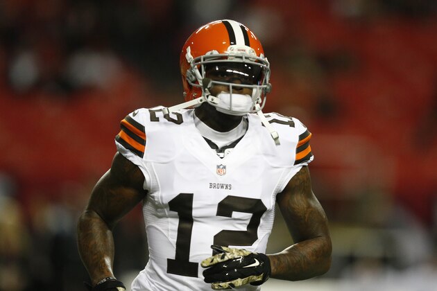 Cleveland Browns wide receiver Josh Gordon (12) warms up before the first half of an NFL football game against the Atlanta Falcons, Sunday, Nov. 23, 2014, in Atlanta. (AP Photo/Brynn Anderson )