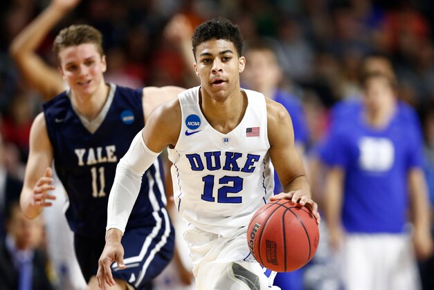 Mar 19, 2016; Providence, RI, USA; Duke Blue Devils guard Derryck Thornton (12) brings the ball up court against the Yale Bulldogs during the first half of a second round game of the 2016 NCAA Tournament at Dunkin Donuts Center. Mandatory Credit: Mark L. Baer-USA TODAY Sports