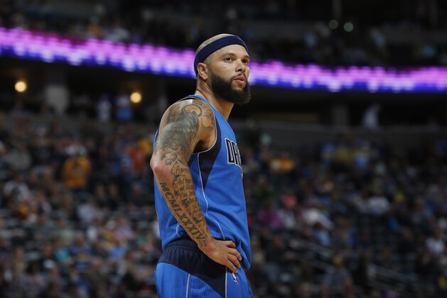 Dallas Mavericks guard Deron Williams looks on as time runs out in overtime of an NBA basketball game against the Denver Nuggets Sunday, March 6, 2016, in Denver. The Nuggets won 116-114 in overtime. (AP Photo/David Zalubowski)