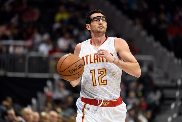 Mar 13, 2016; Atlanta, GA, USA; Atlanta Hawks guard Kirk Hinrich (12) brings the ball up the court against the Indiana Pacers during the second half at Philips Arena. The Hawks defeated the Pacers 104-75. Mandatory Credit: Dale Zanine-USA TODAY Sports