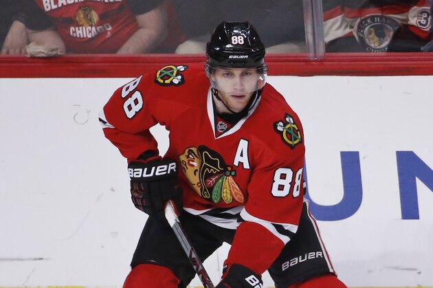 Chicago Blackhawks right wing Patrick Kane (88) looks to pass the puck against the St. Louis Blues during the first period of an NHL hockey game Thursday, April 7, 2016, in Chicago. (AP Photo/Kamil Krzaczynski)