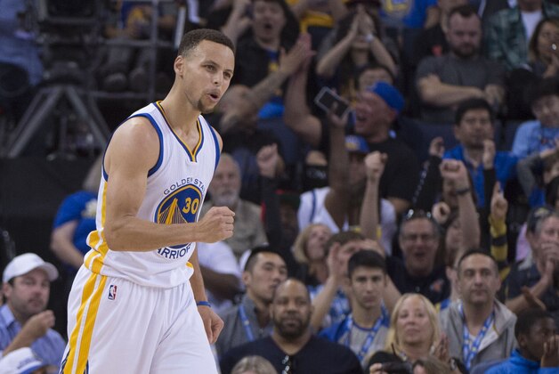 April 3, 2016; Oakland, CA, USA; Golden State Warriors guard Stephen Curry (30) celebrates after making a three-point basket against the Portland Trail Blazers during the second quarter at Oracle Arena. Mandatory Credit: Kyle Terada-USA TODAY Sports