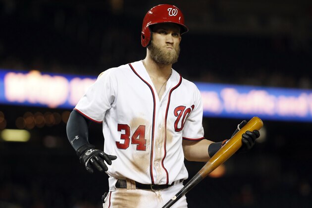 Washington Nationals right fielder Bryce Harper (34) reacts after a called third strike during a baseball game against the Atlanta Braves at Nationals Park, Monday, April 11, 2016, in Washington. The Nationals won 6-4. (AP Photo/Alex Brandon)