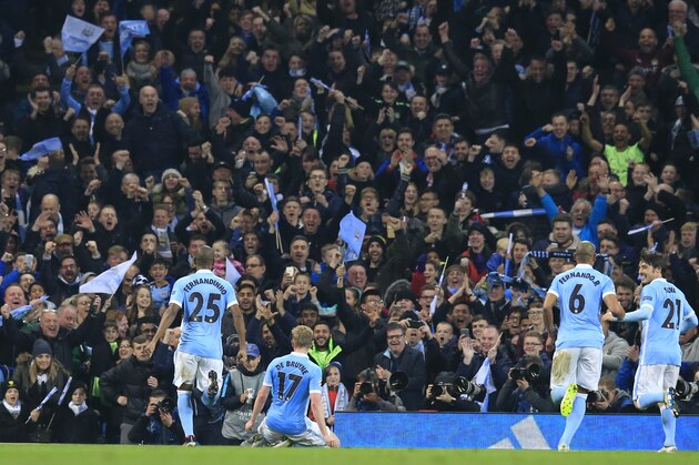 Manchester City's Kevin De Bruyne, No 17, celebrates scoring the opening goal of the game during the Champions League quarterfinal second leg soccer match between Manchester City and Paris Saint Germain at the City of Manchester stadium in Manchester, England  Tuesday, April 12, 2016. City went on to win the game 1-0, and the tie 3-2, and advance to the semifinals.(AP Photo/ Jon Super)