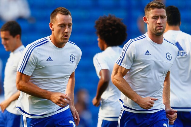 LONDON, ENGLAND - AUGUST 08: John Terry and Gary Cahill of Chelsea warm up prior to  the Barclays Premier League match between Chelsea and Swansea City at Stamford Bridge on August 8, 2015 in London, England.  (Photo by Julian Finney/Getty Images)