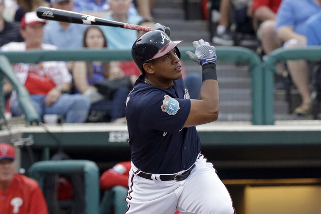 Atlanta Braves' Hector Olivera bats against the Philadelphia Phillies in a spring training baseball game, Thursday, March 24, 2016, in Kissimmee, Fla. (AP Photo/John Raoux)