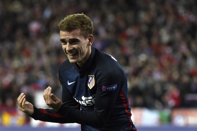 Atletico Madrid's French forward Antoine Griezmann celebrates after scoring during the Champions League quarter-final second leg football match Club Atletico de Madrid vs FC Barcelona at the Vicente Calderon stadium in Madrid on April 13, 2016. / AFP / GERARD JULIEN        (Photo credit should read GERARD JULIEN/AFP/Getty Images)