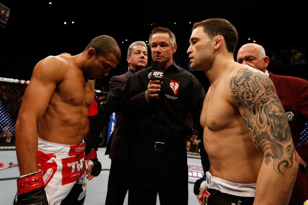 LAS VEGAS, NV - FEBRUARY 02:  Jose Aldo (left) and Frankie Edgar (right) face off before their featherweight title fight at UFC 156 on February 2, 2013 at the Mandalay Bay Events Center in Las Vegas, Nevada.  (Photo by Josh Hedges/Zuffa LLC/Zuffa LLC via Getty Images)