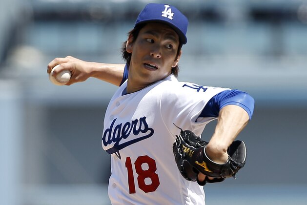 Los Angeles Dodgers starting pitcher Kenta Maeda throws to the plate against the Arizona Diamondbacks during the first inning of a baseball game in Los Angeles, Tuesday, April 12, 2016. (AP Photo/Alex Gallardo)