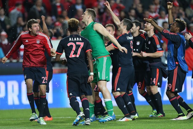 Munich players celebrate after the Champions League quarterfinal second leg soccer match between SL Benfica and Bayern Munich at the Luz stadium in Lisbon Wednesday, April 13, 2016. (AP Photo/Armando Franca)