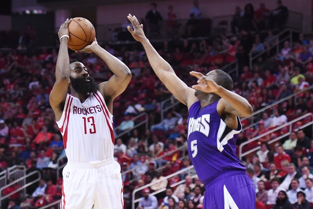 HOUSTON, TEXAS - APRIL 13:  James Harden #13 of the Houston Rockets shoots over James Anderson #5 of the Sacramento Kings during the first half of a game at the Toyota Center on April 13, 2016 in Houston, Texas. NOTE TO USER: User expressly acknowledges and agrees that, by downloading and or using this photograph, User is consenting to the terms and conditions of the Getty Images License Agreement.  (Photo by Stacy Revere/Getty Images)