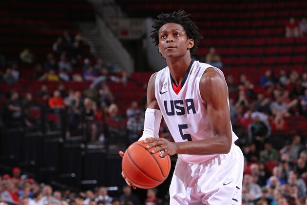 PORTLAND, OR - APRIL 9:  De'Aaron Fox #5 of the USA Junior Select Team shoots a foul shot against the World Select Team during the game on April 9, 2016 at the MODA Center Arena in Portland, Oregon. NOTE TO USER: User expressly acknowledges and agrees that, by downloading and or using this photograph, User is consenting to the terms and conditions of the Getty Images License Agreement. Mandatory Copyright Notice: Copyright 2016 NBAE (Photo by Sam Forencich/NBAE via Getty Images)