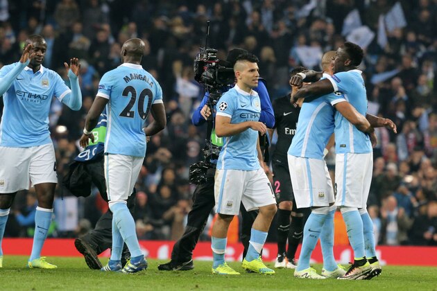 MANCHESTER, ENGLAND - APRIL 12: 
Bacary Sagna (R)of manchester City FC reacts after the victory with teammattes during the UEFA Champions League Quarter Final second leg match between Manchester City FC and Paris Saint-Germain at the Etihad Stadium on April 12, 2016 in Manchester, United Kingdom. (Photo by Xavier Laine/Getty Images)