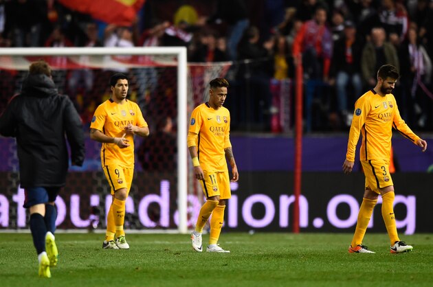MADRID, SPAIN - APRIL 13:  Luis Suarez, Neymar and Gerard Pique of Barcelona react during the UEFA Champions League quarter final, second leg match between Club Atletico de Madrid and FC Barcelona at the Vincente Calderon on April 13, 2016 in Madrid, Spain.  (Photo by Mike Hewitt/Getty Images)