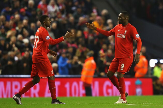 LIVERPOOL, ENGLAND - DECEMBER 13:  Divock Origi of Liverpool (L) celebrates with Christian Benteke as he scores their second goal during the Barclays Premier League match between Liverpool and West Bromwich Albion at Anfield on December 13, 2015 in Liverpool, England.  (Photo by Alex Livesey/Getty Images)
