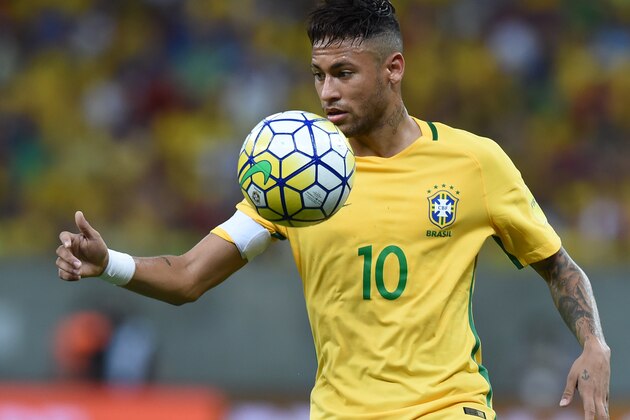 Brazil's Neymar controls the ball during the Russia 2018 FIFA World Cup South American Qualifiers' football match against Uruguay, in Recife, northeastern Brazil, on March 25, 2016.   AFP PHOTO / VANDERLEI ALMEIDA / AFP / VANDERLEI ALMEIDA        (Photo credit should read VANDERLEI ALMEIDA/AFP/Getty Images)