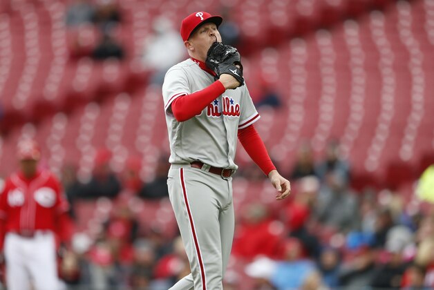 Philadelphia Phillies relief pitcher Daniel Stumpf walks to the dugout after being pulled from the game during the fourth inning of a baseball game against the Cincinnati Reds, Thursday, April 7, 2016, in Cincinnati. (AP Photo/Gary Landers)