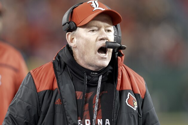 Louisville head coach Bobby Petrino yells to his players in the second half of the Music City Bowl NCAA college football game against Texas A&M Wednesday, Dec. 30, 2015, in Nashville, Tenn. Louisville won 27-21. (AP Photo/Mark Humphrey)