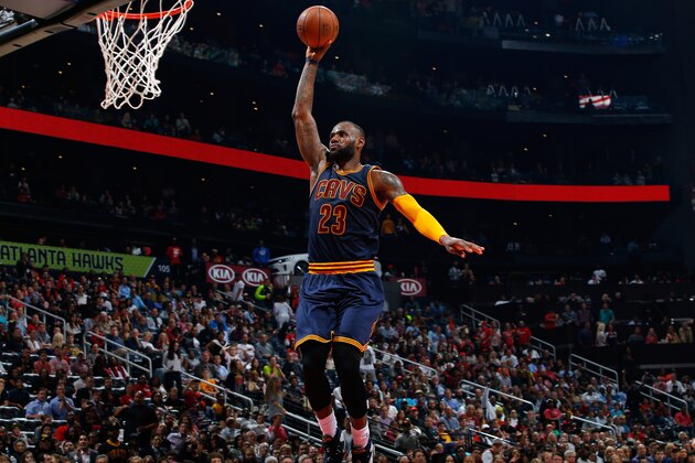 ATLANTA, GEORGIA - APRIL 01:  LeBron James #23 of the Cleveland Cavaliers dunks against the Atlanta Hawks at Philips Arena on April 1, 2016 in Atlanta, Georgia.  NOTE TO USER User expressly acknowledges and agrees that, by downloading and or using this photograph, user is consenting to the terms and conditions of the Getty Images License Agreement.  (Photo by Kevin C. Cox/Getty Images)